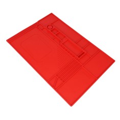 Almofada vermelha da isola&ccedil;&atilde;o t&eacute;rmica do silicone da bancada do reparo da eletr&ocirc;nica do telefone m&oacute;vel...