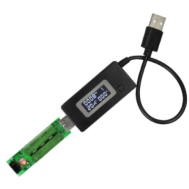 Testador USB preto com carga, detector de corrente e volt&iacute;metro com tela LCD